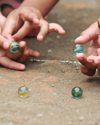 Children grasping small objects